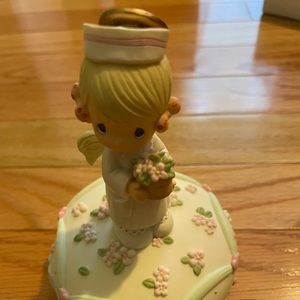Precious Moments Nurse Holding Pot Musical-early release